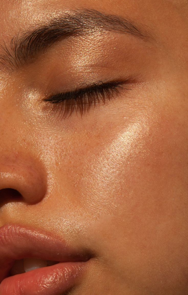 Close-up of radiant, even-toned skin — illuminate tallow balm by nudea for dullness, uneven tone, and skin glow