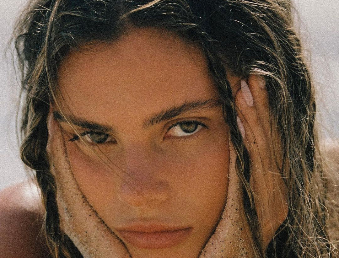 Close-up of a natural beach look model representing Nudea Skin — Australian clean beauty brand with grass-fed tallow skincare.